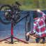 Best bike stands for heavy e-bikes UK 2026 — Feedback Sports Pro Mechanic HD repair stand holding an e-MTB